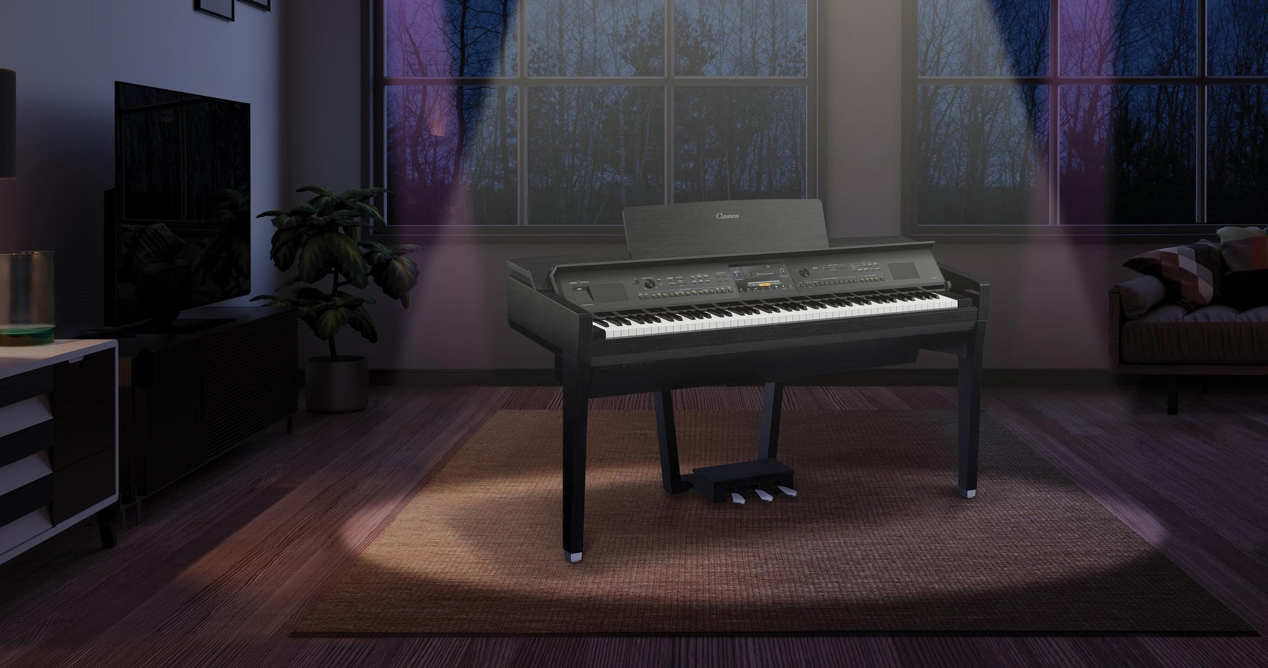 Image of a CVP-800 Series piano in a living room, with a spotlight over the piano