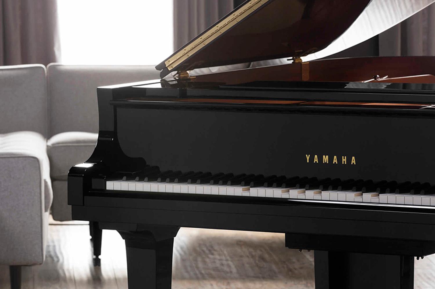 Photo of a Yamaha Disklavier Enspire piano in a living room